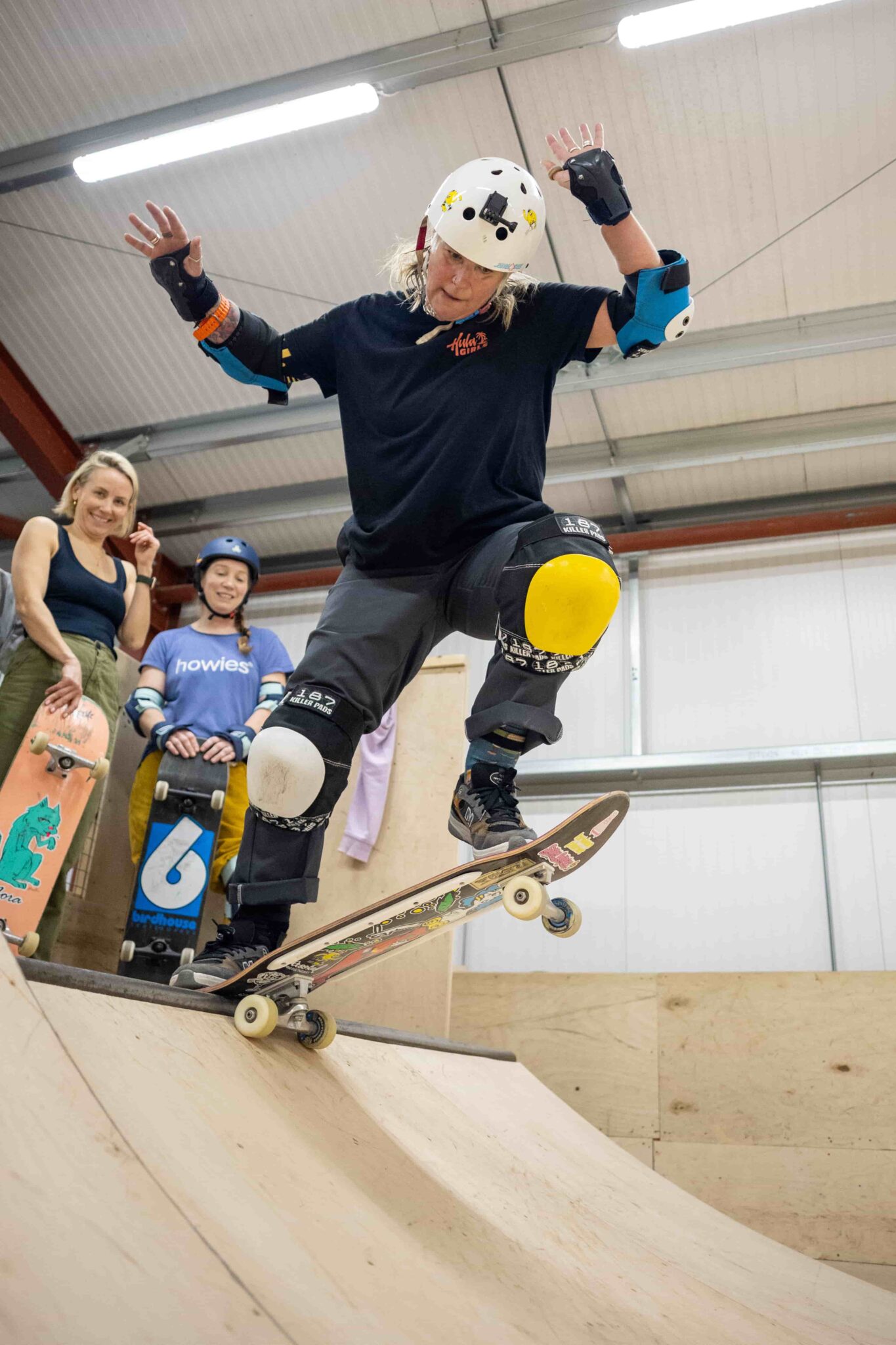 A young child learning on a ramp